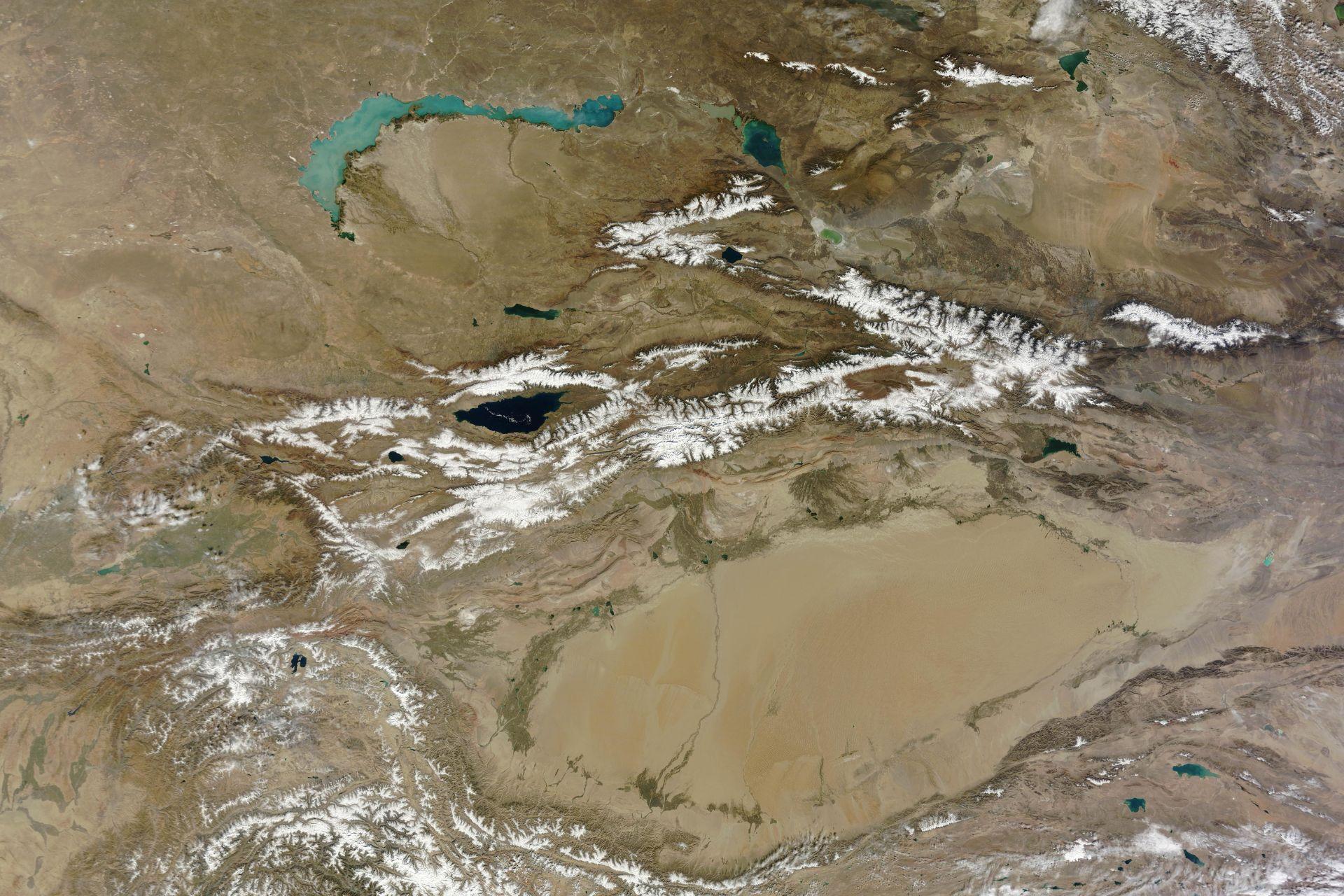 tien-shan-mountain-range-central-asia-contrast-between-snowy-mountains-and-vast-arid-regions.jpg tien-shan-mountain-range-central-asia-contrast-between-snowy-mountains-and-vast-arid-regions.jpg